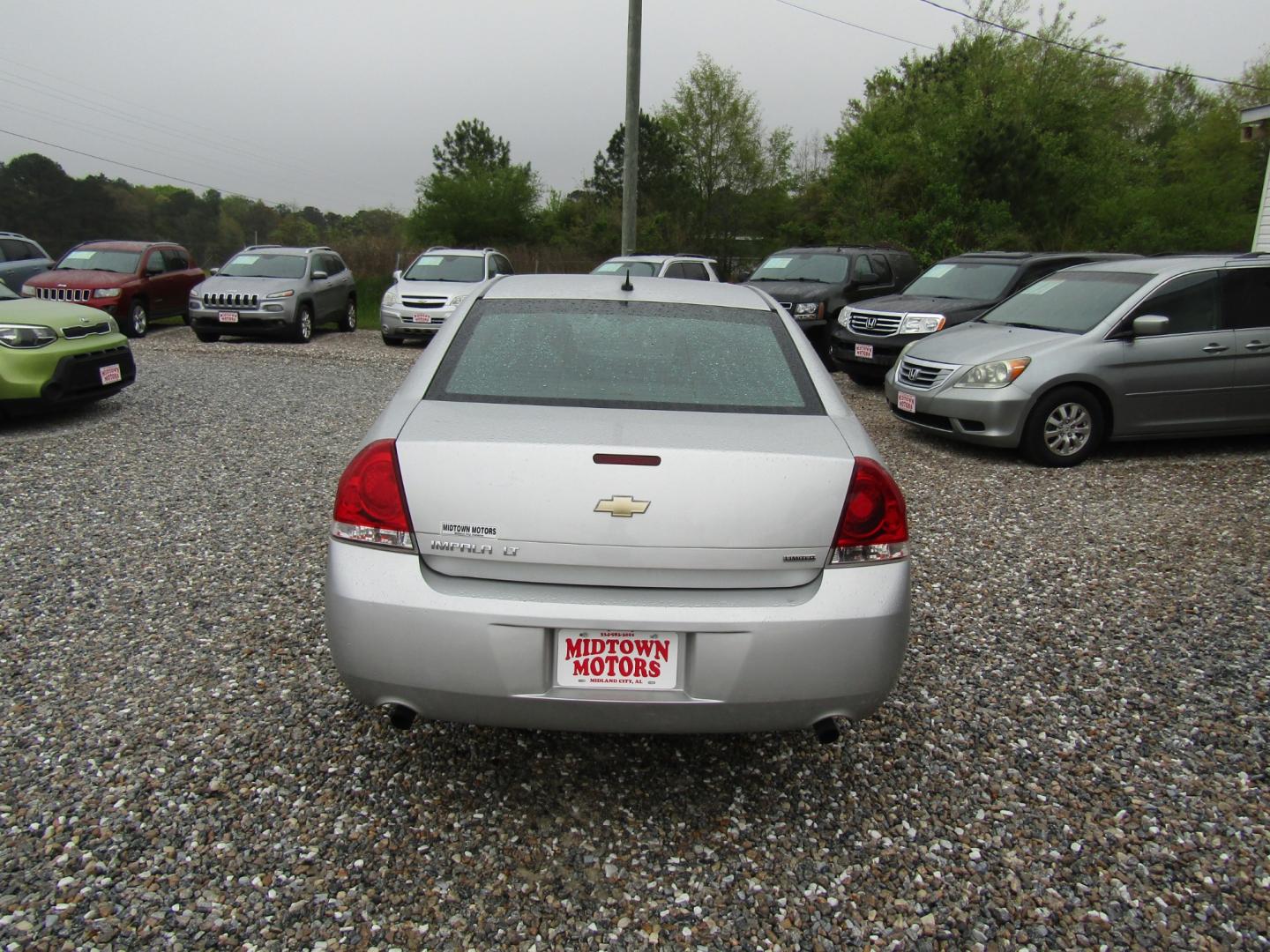 2014 Silver Chevrolet Impala LT (2G1WB5E30E1) with an 3.6L V6 DOHC 16V FFV engine, Automatic transmission, located at 15016 S Hwy 231, Midland City, AL, 36350, (334) 983-3001, 31.306210, -85.495277 - Photo#6